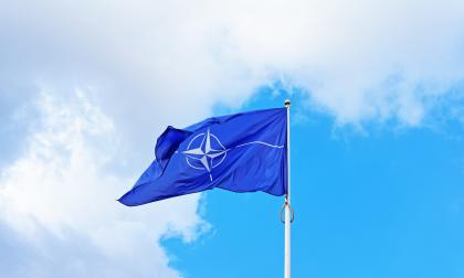 Vilnius, Lithuania - September 3, 2015: NATO flag waving by the wind