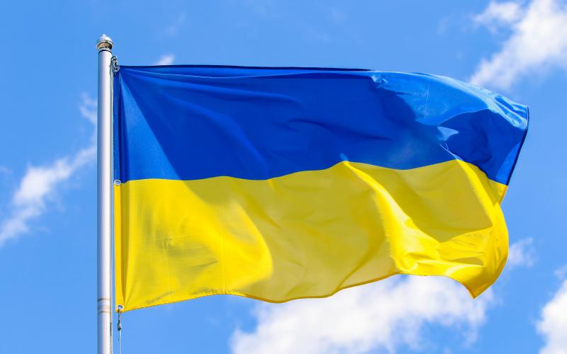 Flag of Ukraine on a background of blue sky