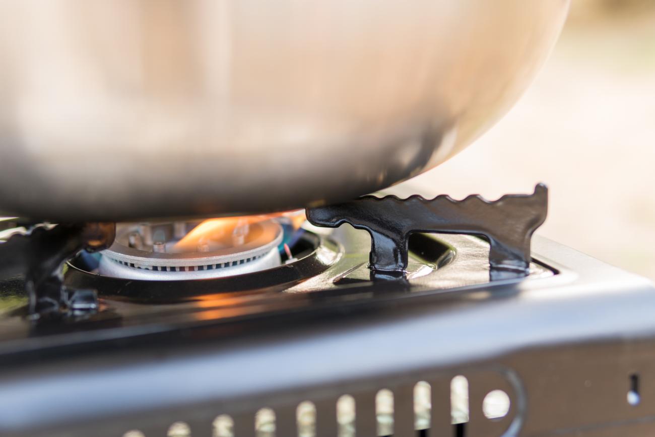 Cooking on camping gas stove.